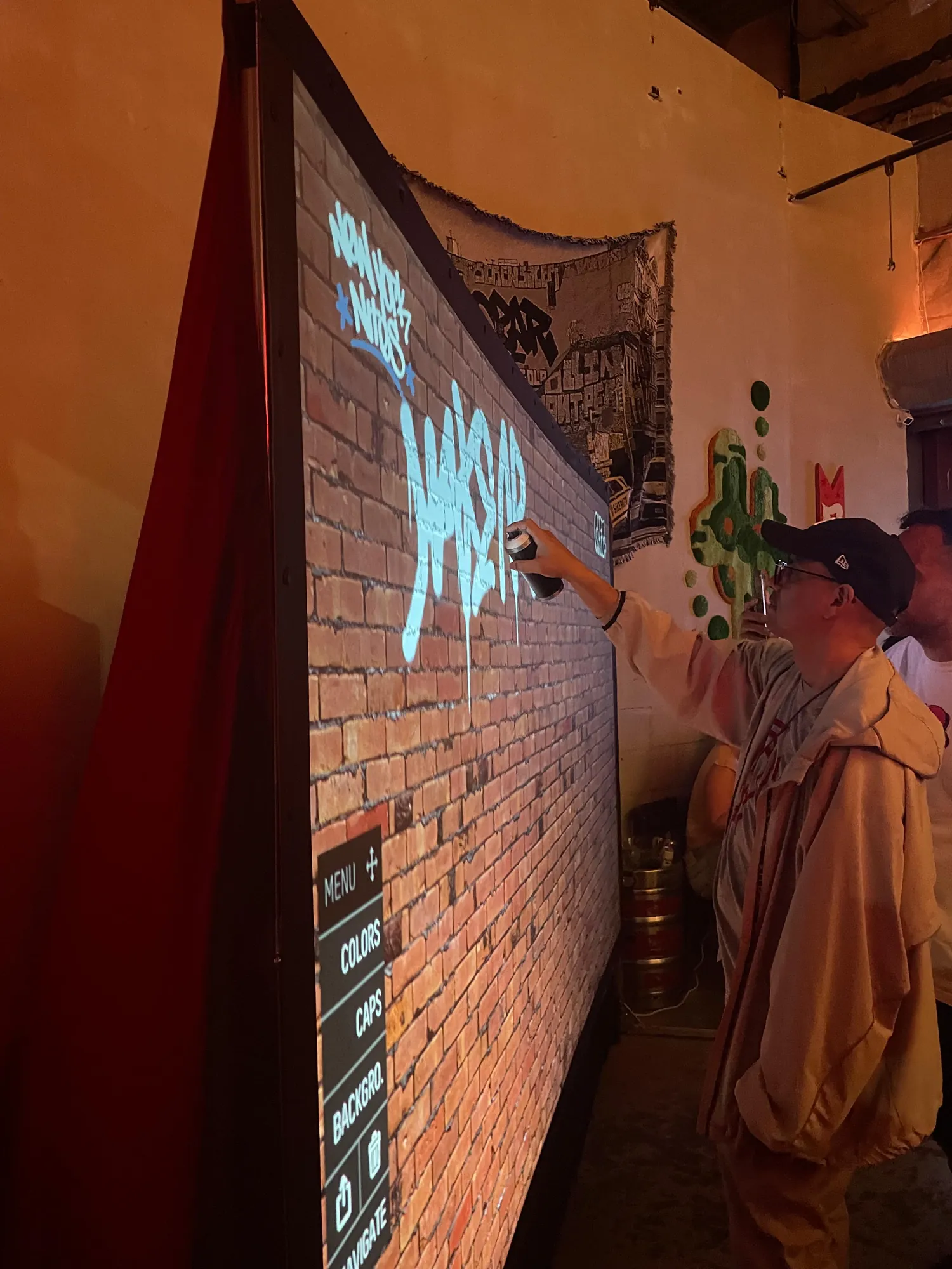 A piece glowing on the projected digital wall