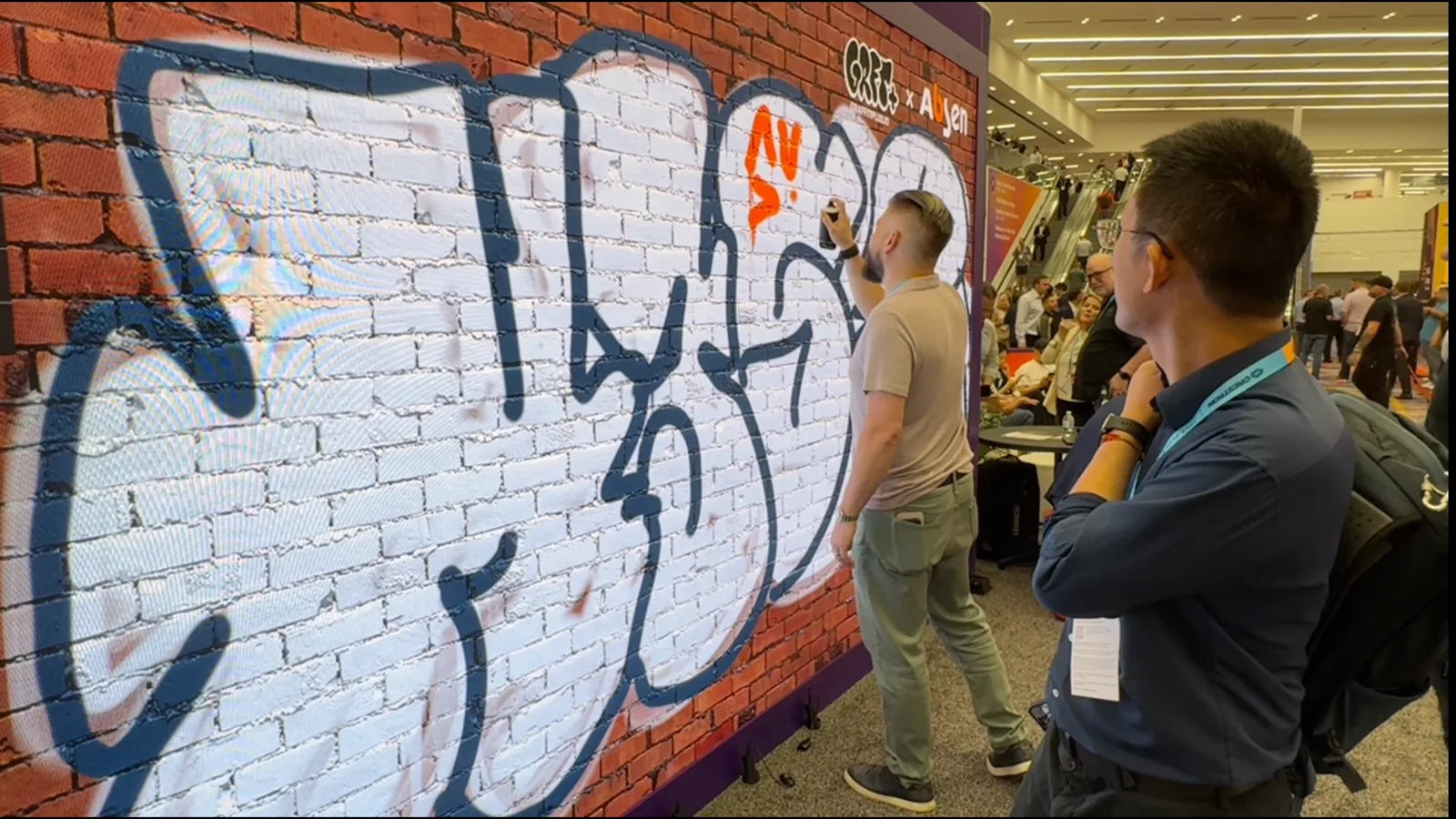 Absen x Graffiti+ interactive graffiti wall at the InfoComm entrance