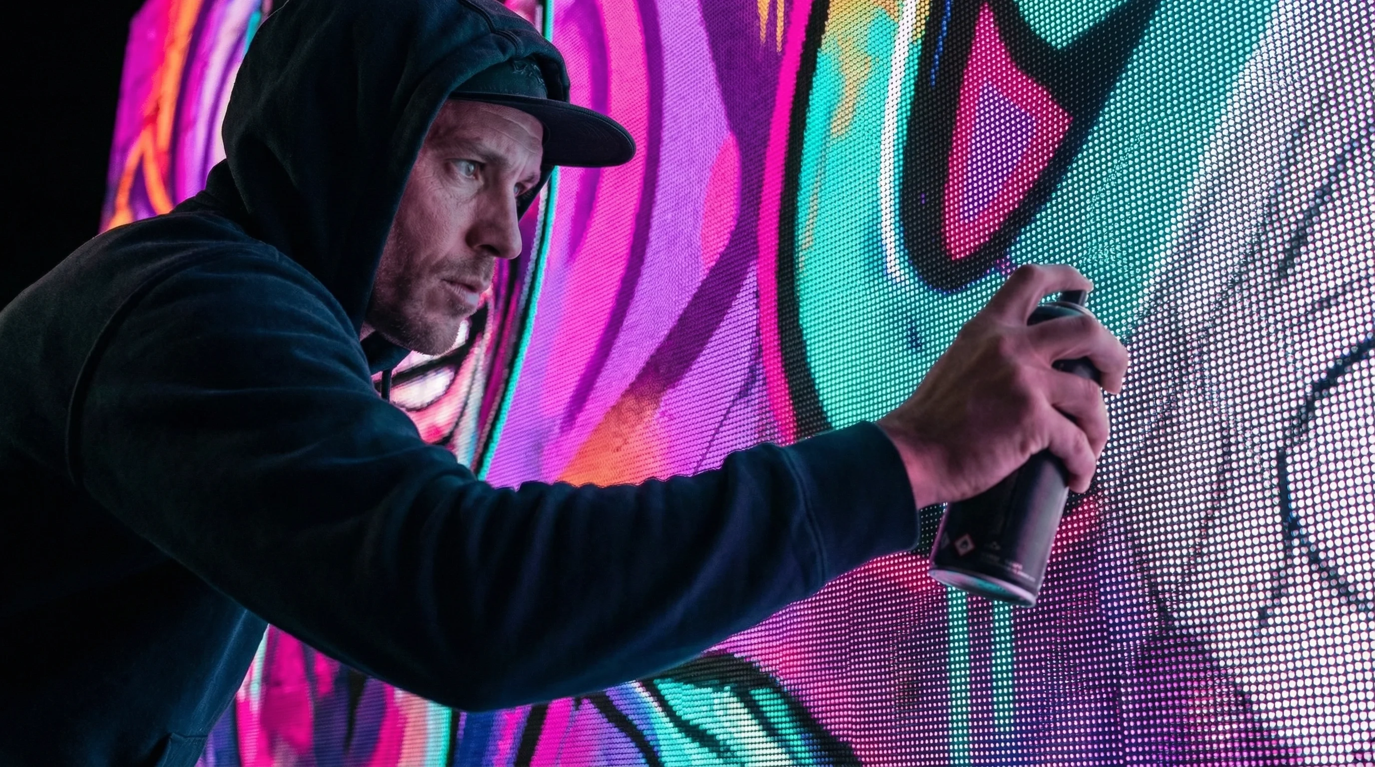 Pro graffiti writer painting on Graffiti+ interactive digital graffiti wall